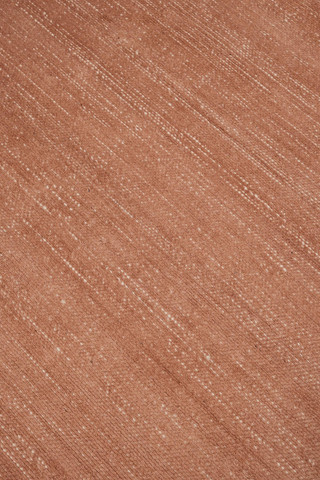 Close-up of Vara rug in Terra, showing silk-wool tactile contrast