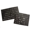 image: large print computer labels, white on black