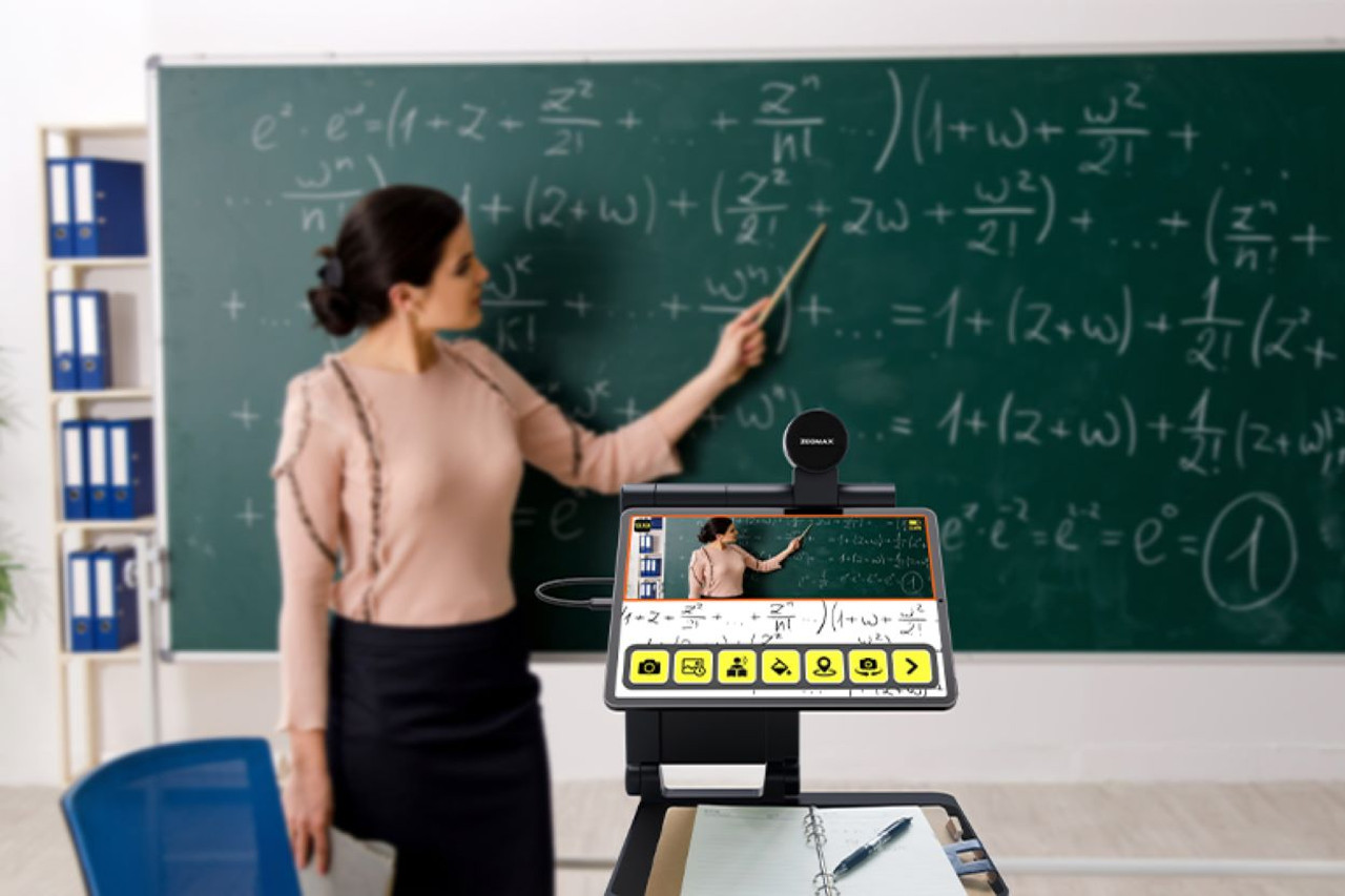 Image: snow Pad, with teacher in background Image: snow Pad, with teacher in background
