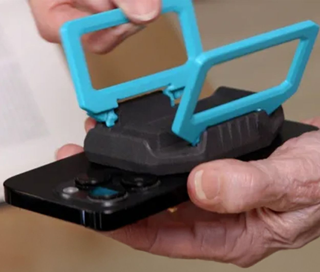 Image: sight stand cell phone stand and magnifier, legs open