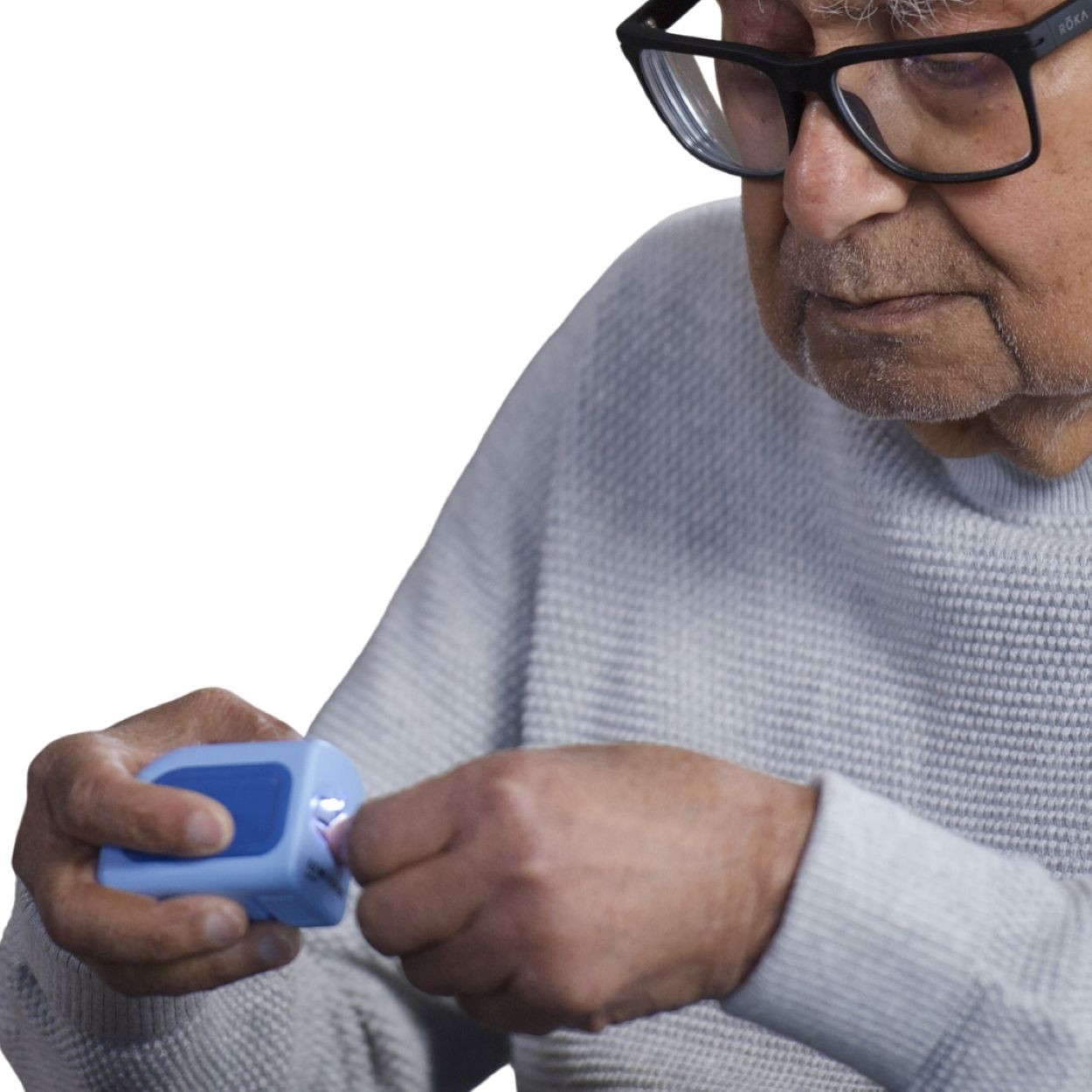 Image: Lil Nipper automatic nail clipper, with woman