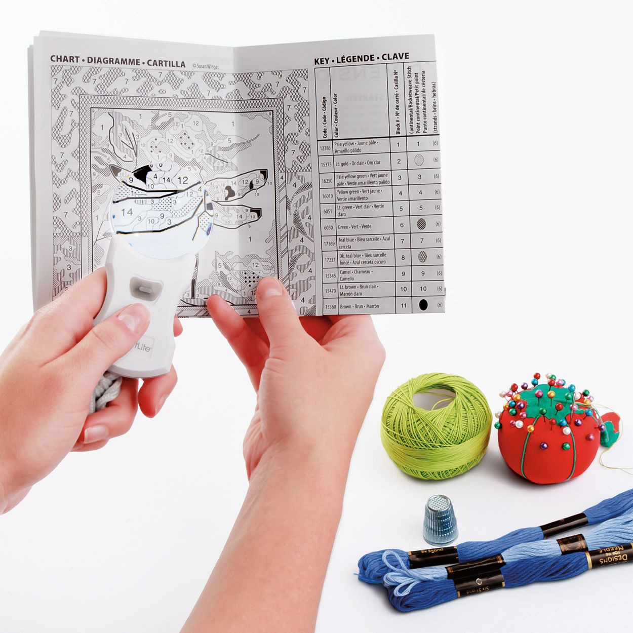 Image: OTTlite rimless pendant 3X magnifier, in use