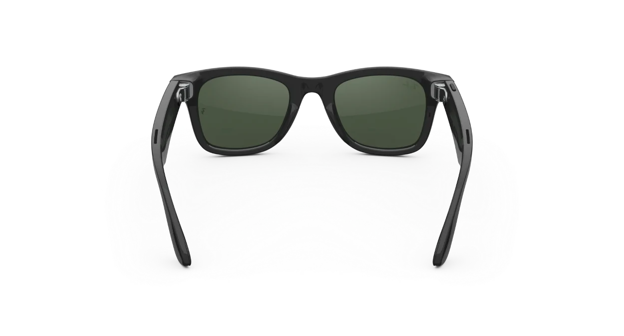 image: Ray-Ban Meta glasses with green transition lenses, dark, back view