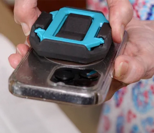 Image: sight stand cell phone stand and magnifier, on back of phone