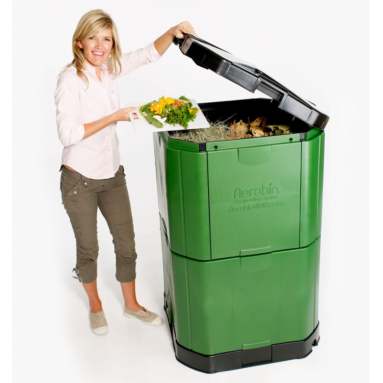 A) Home composter with an aerator on the lid, (B) material in