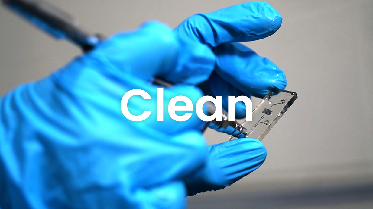 Cleaning printed microfluidic device