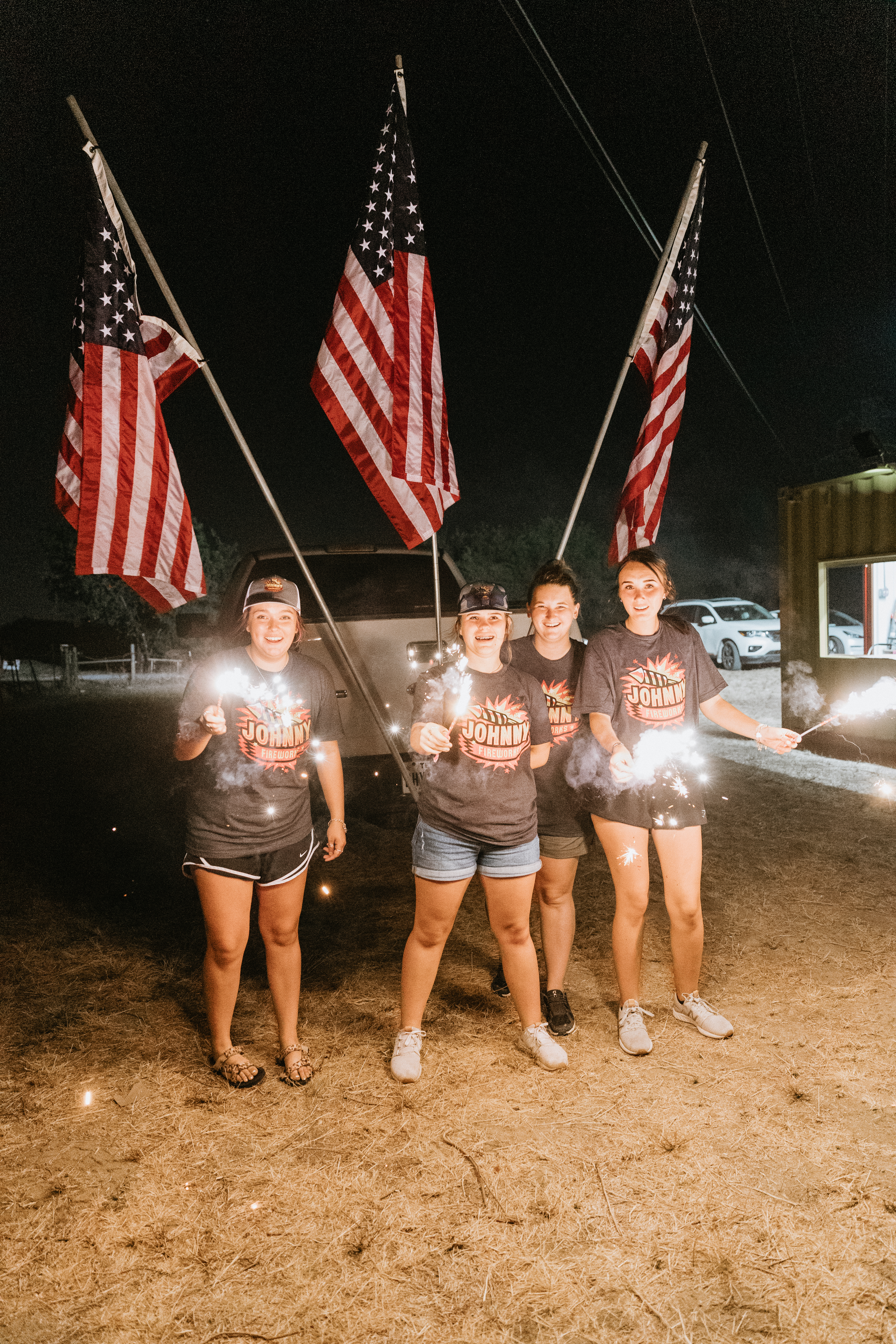 People holding fireworks during celebration