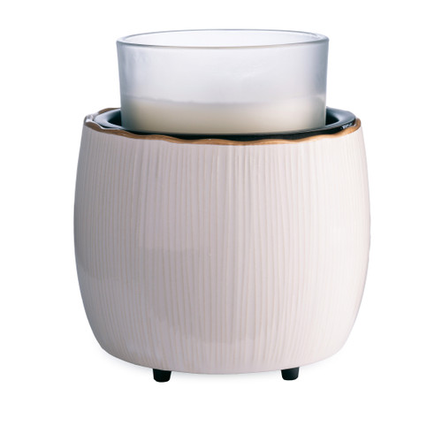 Elevate your home with the Golden Ridges Crock Candle Warmer, featuring an ivory stoneware body accented by a refined gold ridged rim for timeless style.