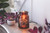 The Apothecary Illumination Fragrance warmer will allure you with amber-colored glass and an Edison style bulb from within. The enchanting dark academia glow that fills the room will set the vibe for a relaxing night at home while bringing any style of decor to life. Melt your favorite home fragrance in the dish on top of the vessel, which resembles an old fashioned medicine jar.