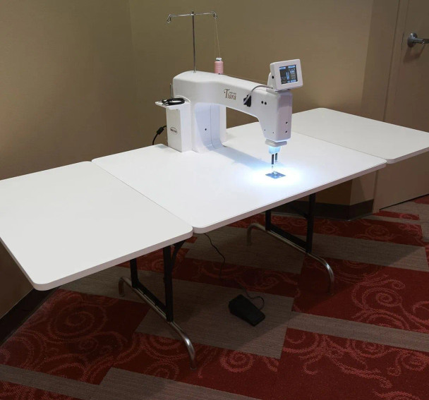Overview
The optional quilting extension table gives an additional 18" of space to accommodate even larger projects.