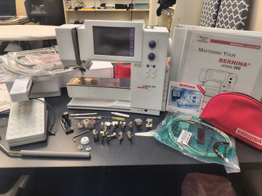 Manuel D'instructions Pour Machine à Coudre Et Broder Bernina Artista 200