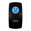 SAD rocker switch with laser-etched sad icon, with the blue LED backlight on
