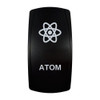 ATOM rocker switch with laser-etched atom icon, in daylight