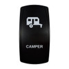 CAMPER rocker switch with laser-etched travel trailer icon, in daylight