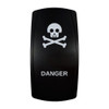DANGER rocker switch with laser-etched skull & crossbones icon, in daylight