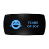 TEARS OF JOY horizontal rocker switch with laser-etched tears of joy icon, with the blue LED backlight on