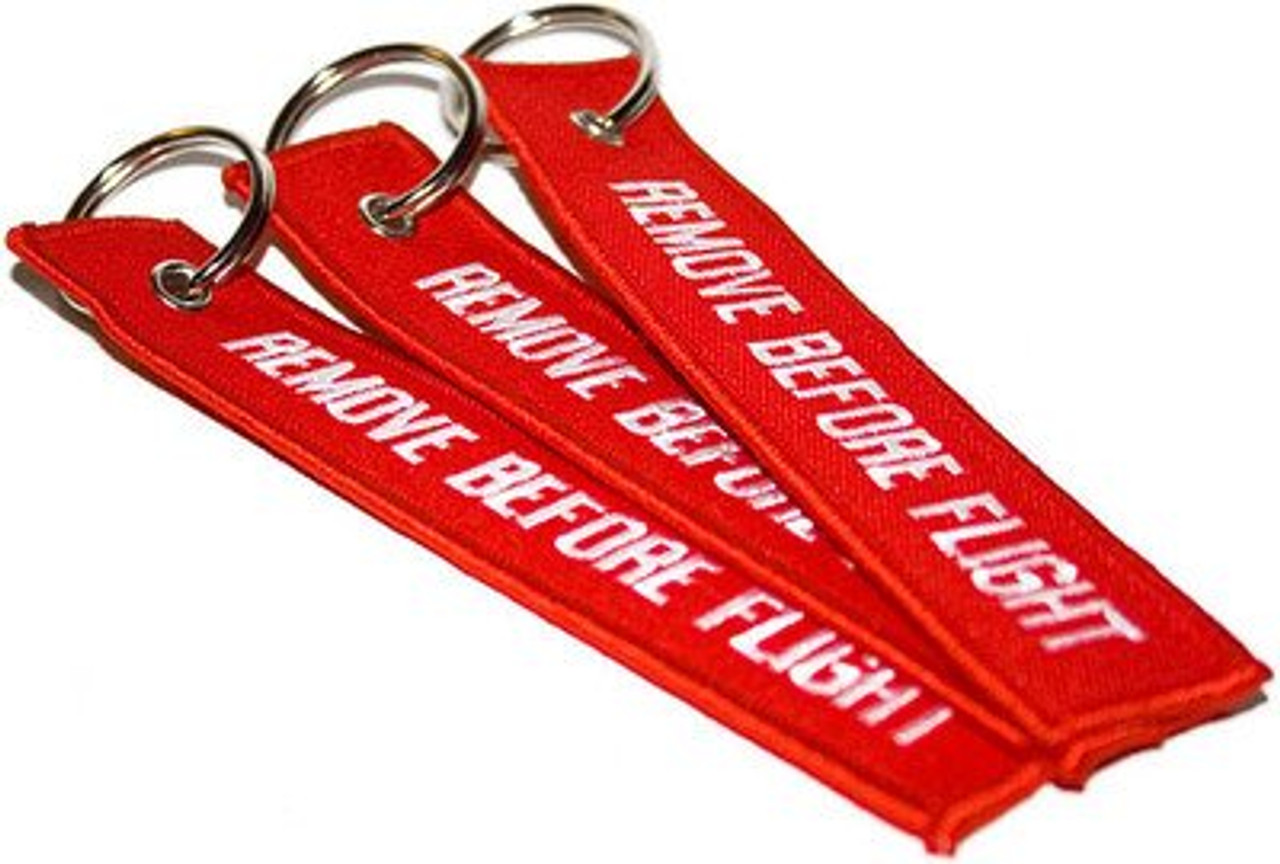 Ключи flight. Ленточный брелок на ключи. Брелок для ключей remove before Flight. Ключ на ленточке. Брелок ленточка на ключи.