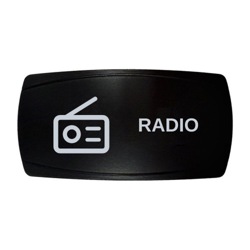 RADIO horizontal rocker switch with laser-etched radio icon, in daylight
