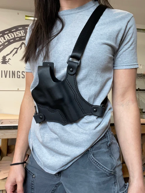Revolver chest holster with thumb break, worn