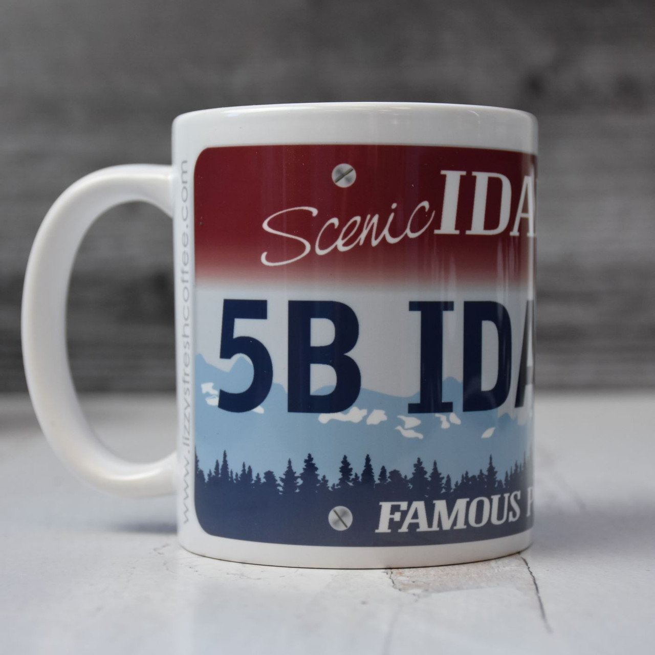 https://cdn11.bigcommerce.com/s-j7rwy2u58c/images/stencil/1280x1280/products/135/404/lizzy-s-graphic-5b-idaho-mug-11-oz-20__41466.1651653343.jpg?c=1