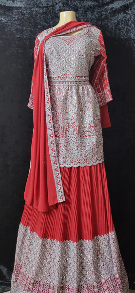 Red with heavy silver work Lehenga 