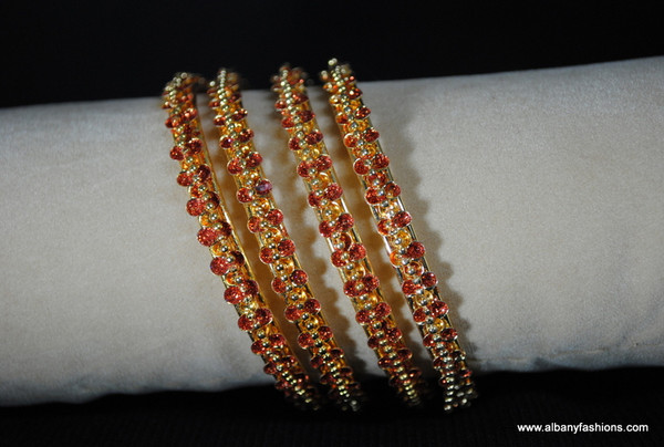 Gold Plated red studded stones Bangles (4 pieces)
