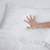 Down Alternative Extra Thin, Flat & Soft Pillow for Stomach Sleepers  – Assembled in the USA by DOWNLITE® (Hypoallergenic) - Hand pushing down to show Softness