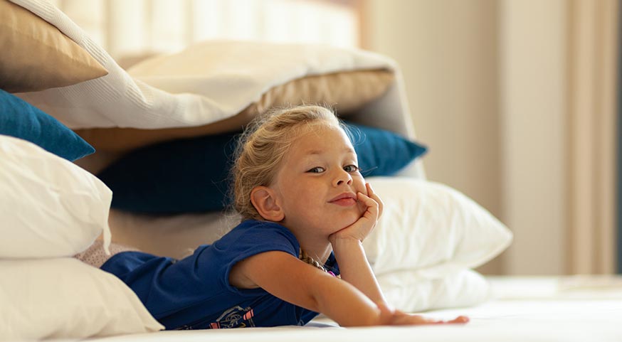 Make a Pillow Fort with Your Bedding and Bring Joy Inside