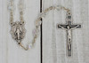 Crystal Clear Rosary Beads with Madonna and Child Centerpiece