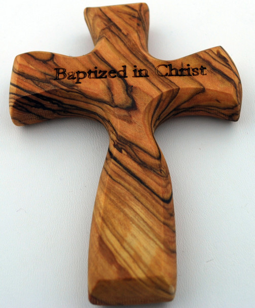 Holding Cross Made of Real Olive Wood in the Holy Land.