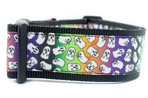 A black dog collar with a rainbow and white ghost pattern. 