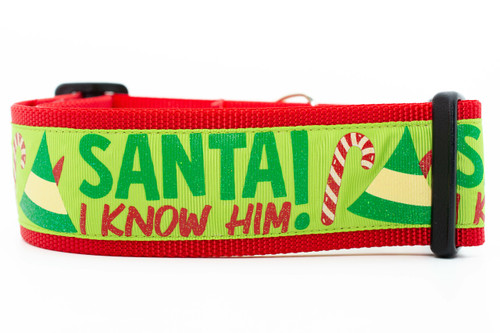 2 inch wide red dog collar with "Santa I Know Him" on green ribbon with elf hat and candy cane.