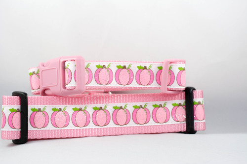 Pink dog collar with repeating pattern of glittery pink pumpkins.