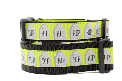 Collar with black nylon and glittering tombstones with RIP and a lime green background.  Top is 1 inch wide and bottom is 1.5 inches wide.