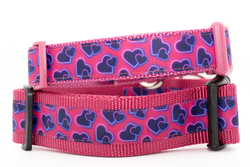 Collar with rose nylon and navy neon hearts on a pink background.  Top is 1 inch wide and bottom is 1.5 inch wide.  Collars pictured are buckle style. Collar with rose nylon and navy neon hearts on a pink background.  Top is 1 inch wide and bottom is 1.5 inch wide.  Collars pictured are buckle style.