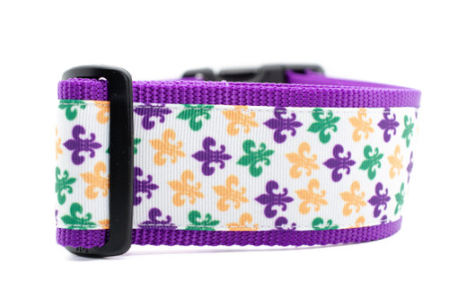 2 inch wide collar with purple nylon and a fleur-de-lis Mardi Gras pattern.