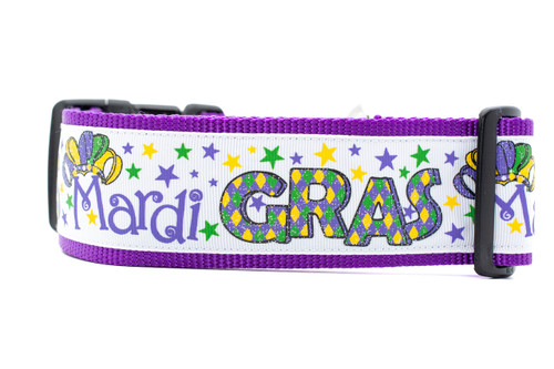 2 inch wide collar with purple nylon and a glittery Mardi Gras pattern.