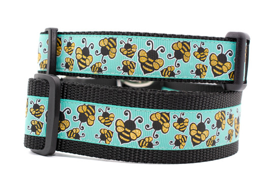 Glittery honey bees on aqua ribbon and black nylon.  Top is 1 inch wide and bottom is 1.5 inch wide. Glittery honey bees on aqua ribbon and black nylon.  Top is 1 inch wide and bottom is 1.5 inch wide.