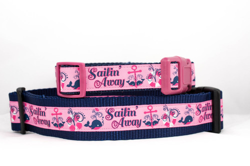 Pink and navy blue collar with words "Sailin' Away" along with whales, anchors, and life rafts