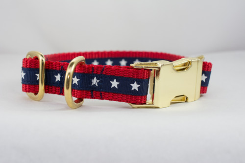Dog collar with red nylon and a navy American star ribbon trim and brass plated hardware.