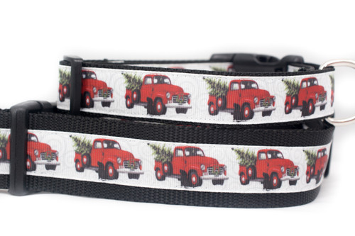 Dog collar with a pattern of red pickup trucks carrying Christmas trees.