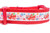 Collar with a Christmas themed pattern. The pattern features red airplanes carrying presents, snowflakes, and candy canes. 
