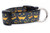 Black dog collar with a pattern of orange jack-o'-lantern faces.