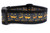 Black dog collar with a pattern of orange jack-o'-lantern faces.