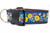 Collar with a pattern of sunflowers, acorns and leaves on a navy background.
