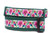 A green dog collar with a tropical print featuring pink flowers and humming birds.