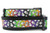 A black dog collar with white ghosts and a rainbow colored pattern. 