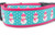 This pink collar has a pattern of snowmen wearing pink hats and scarves on a polka dot background.