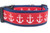 Red glittery anchors on a red ribbon background with 2 inch wide navy blue nylon webbing and black buckle.