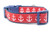 Red glittery anchors on a red ribbon background with 1 inch wide navy blue nylon webbing and navy blue buckle.